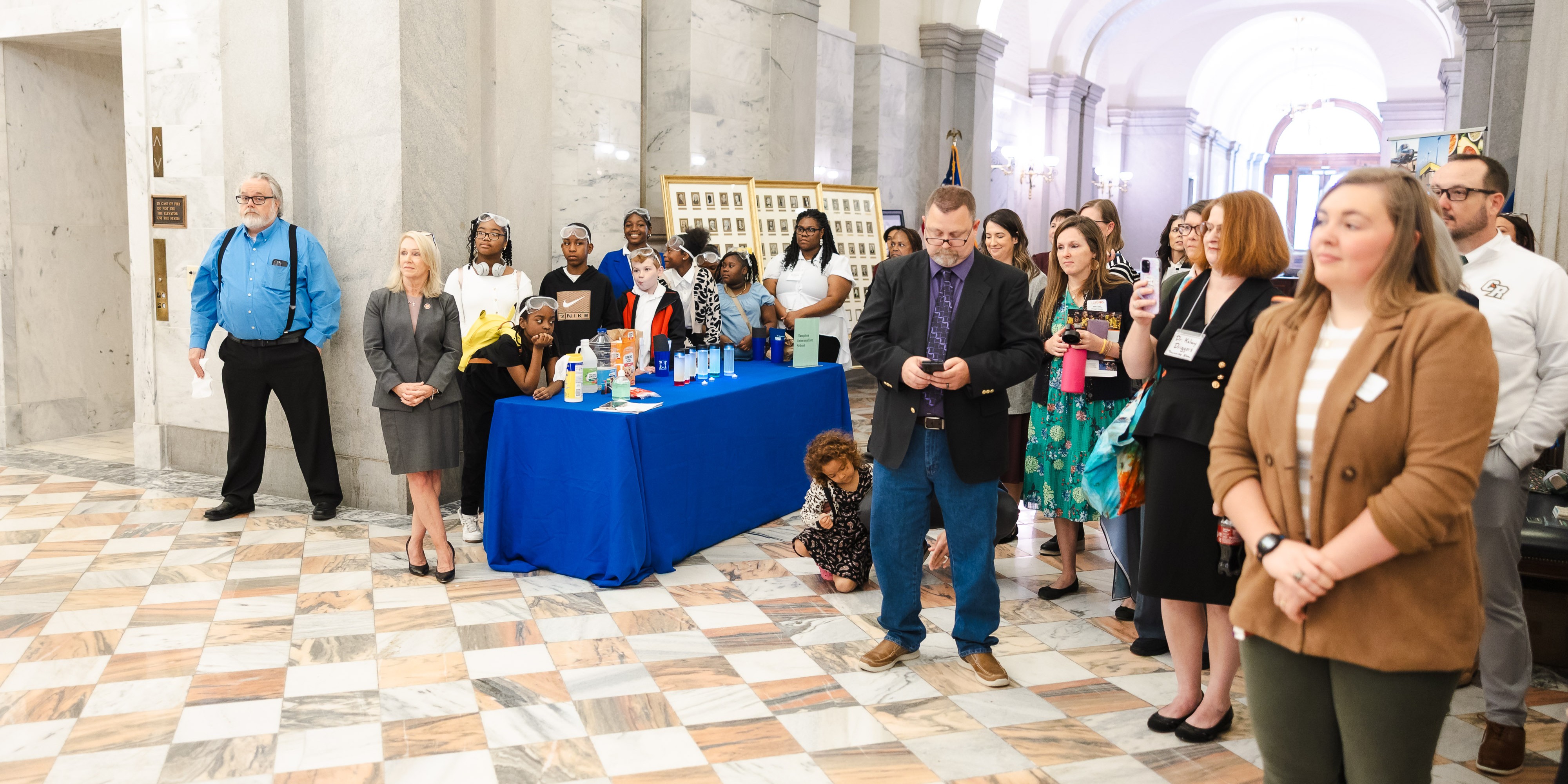 Group of diverse people, legislators, staff, students, teachers at the STEM Day at the Capitol in March 2026